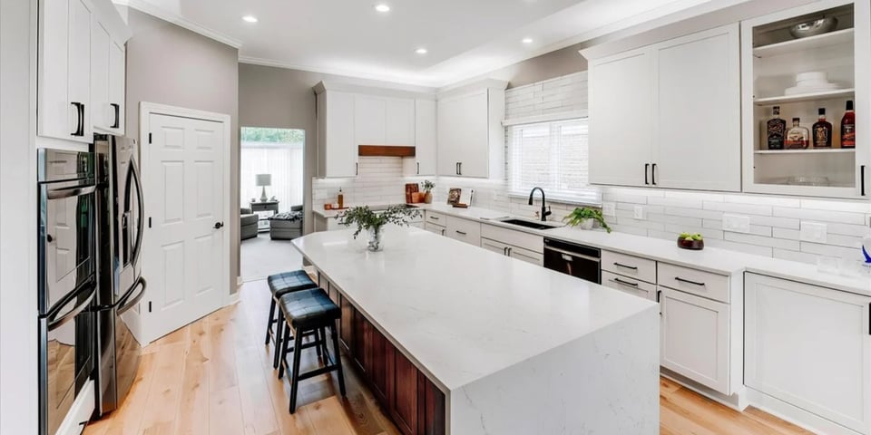 Cabinet Creations renovated this Oakland County kitchen with quartz countertops and modern appliances