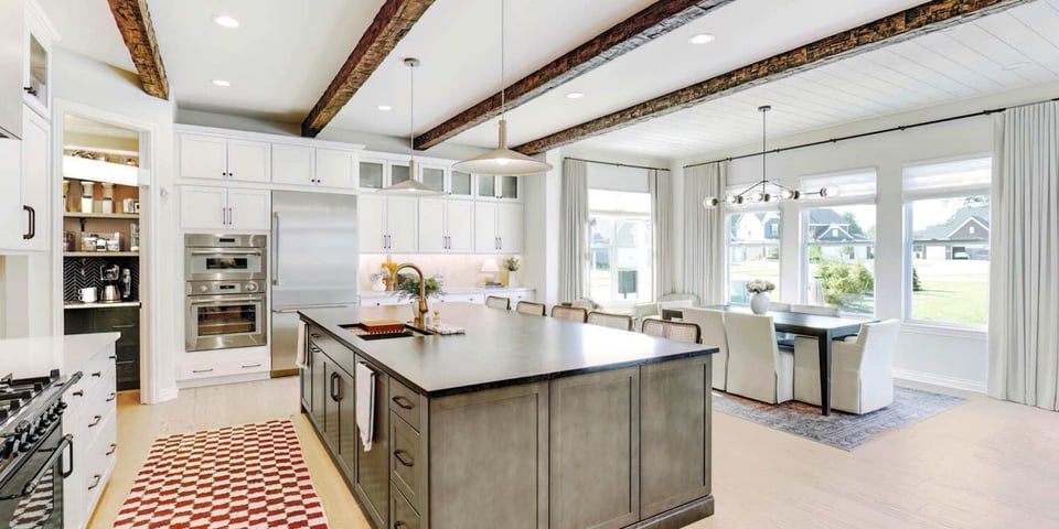 Transitional kitchen remodel with white shaker cabinets and contrasting island by Cabinet Creations in Oakland County, MI