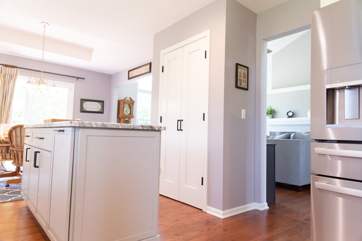 Bright custom kitchen featuring shaker cabinets and hardwood floors designed by Cabinet Creations, Bloomfield Hills, Michigan