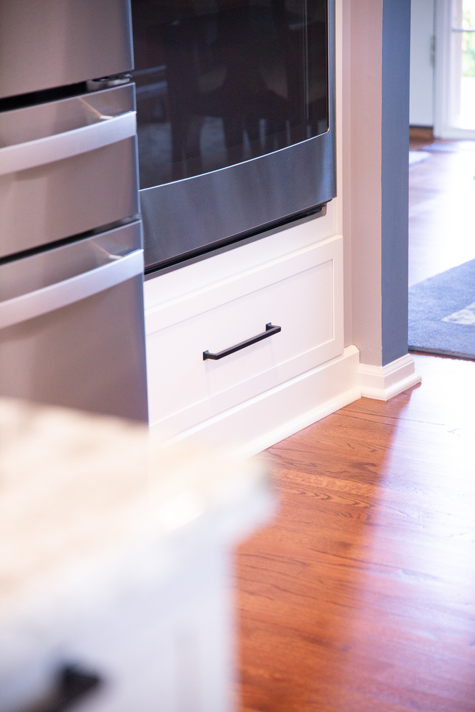 Close-up of built-in oven and cabinetry from a custom kitchen remodel by Cabinet Creations in White Lake, Michigan