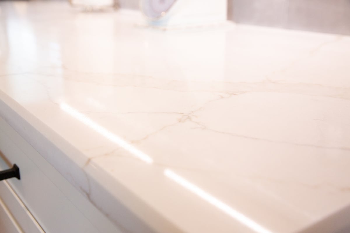 Polished granite countertop detail in a custom kitchen by Cabinet Creations in Waterford Township, MI