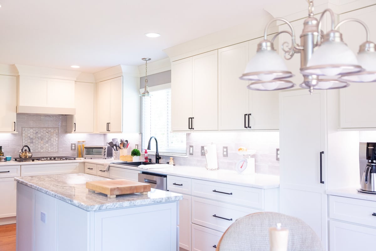 Spacious kitchen design with natural light and modern finishes by Cabinet Creations in Oakland County, MI