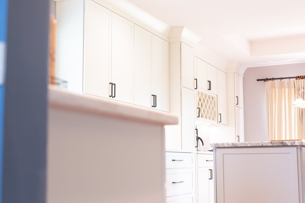 White shaker cabinets and crown molding in a custom kitchen by Cabinet Creations in Bloomfield Hills, MI