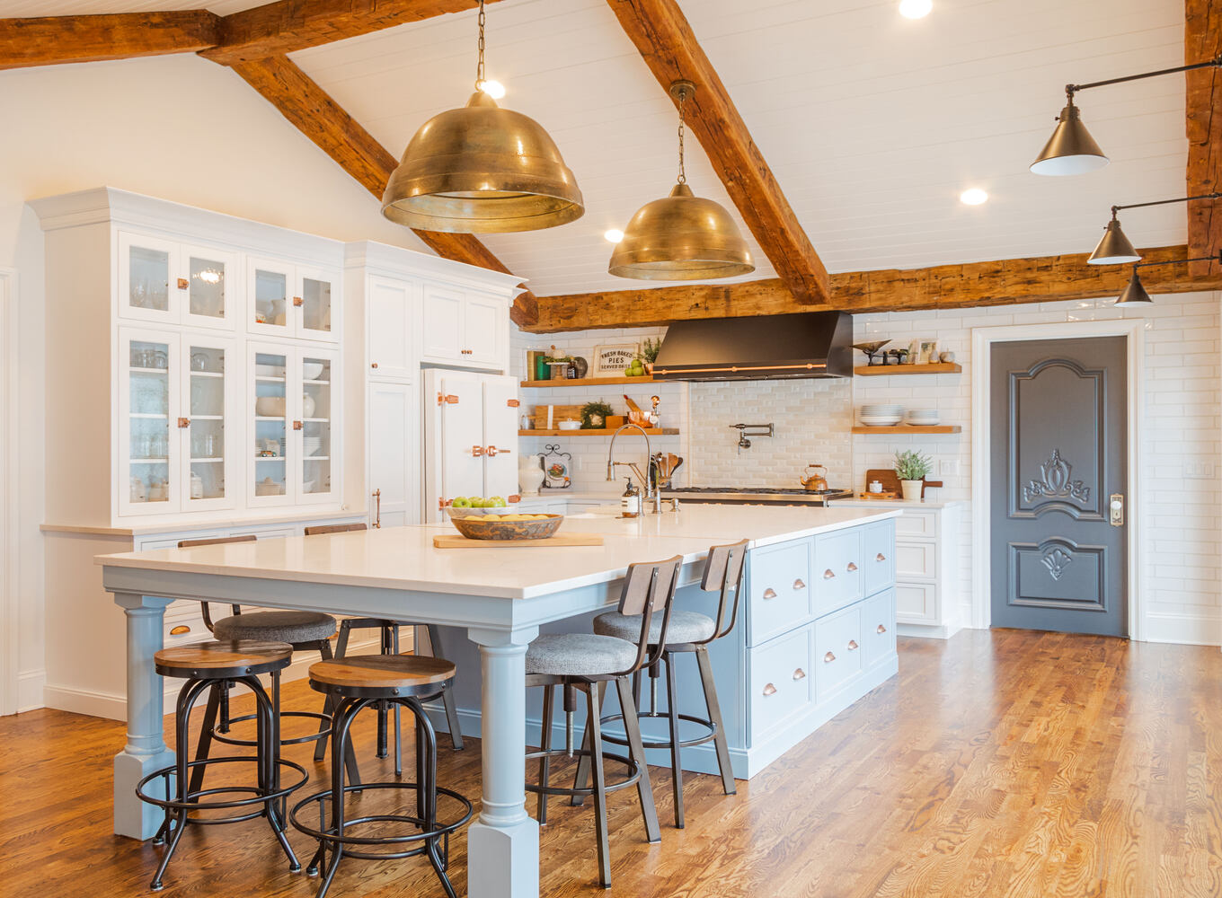 Wide-angle view of custom kitchen design by Cabinet Creations in Clarkston, MI featuring blue island and wood floors Wide-angle view of custom kitchen design by Cabinet Creations in Clarkston, MI featuring blue island and wood floors