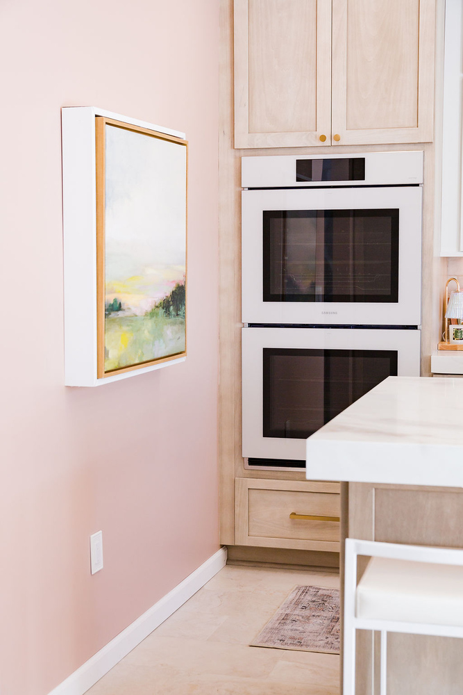 Built-in double oven and light wood cabinets in a Cabinet Creations kitchen, Bloomfield Hills, Michigan