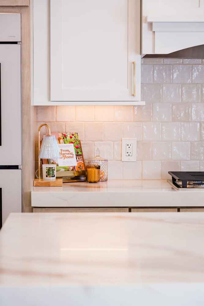 Modern kitchen backsplash and countertop styling in a Cabinet Creations home, Waterford Township, MI