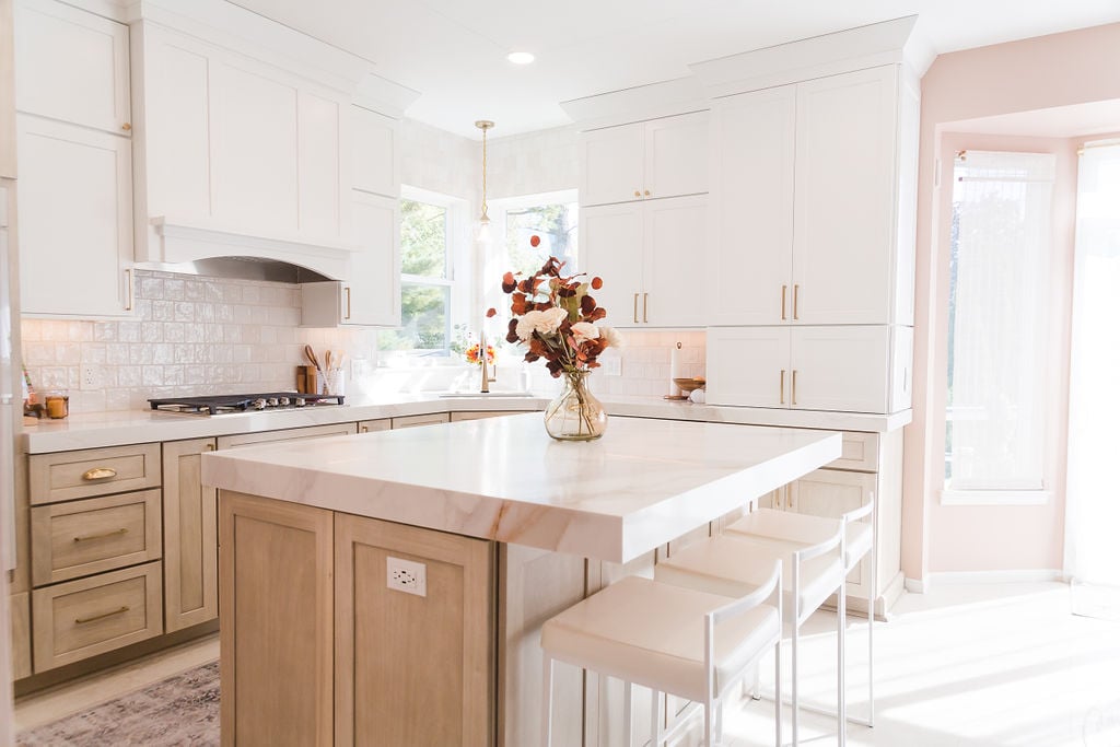 Modern kitchen island and light wood cabinetry designed by Cabinet Creations in Oakland County, MI