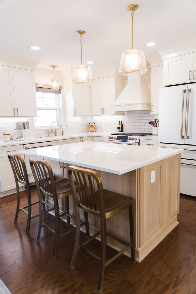 Elegant island design with pendant lights in a Ferndale custom home kitchen