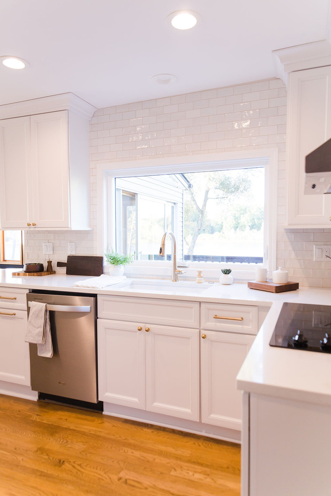 Custom kitchen with white cabinetry and modern hardware in Oakland County, MI by Cabinet Creations