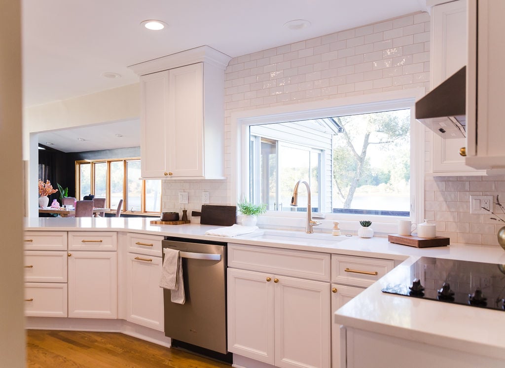 Large kitchen window and full sink wall with natural light in a Cabinet Creations remodel in Oakland County, MI
