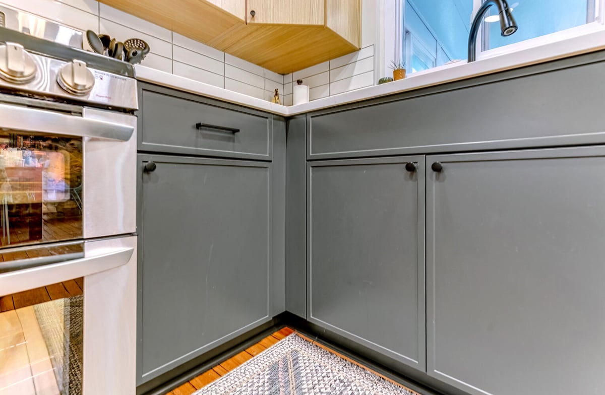 Waterford Township kitchen base cabinet corner with flat-panel drawers and modern hardware by Cabinet Creations