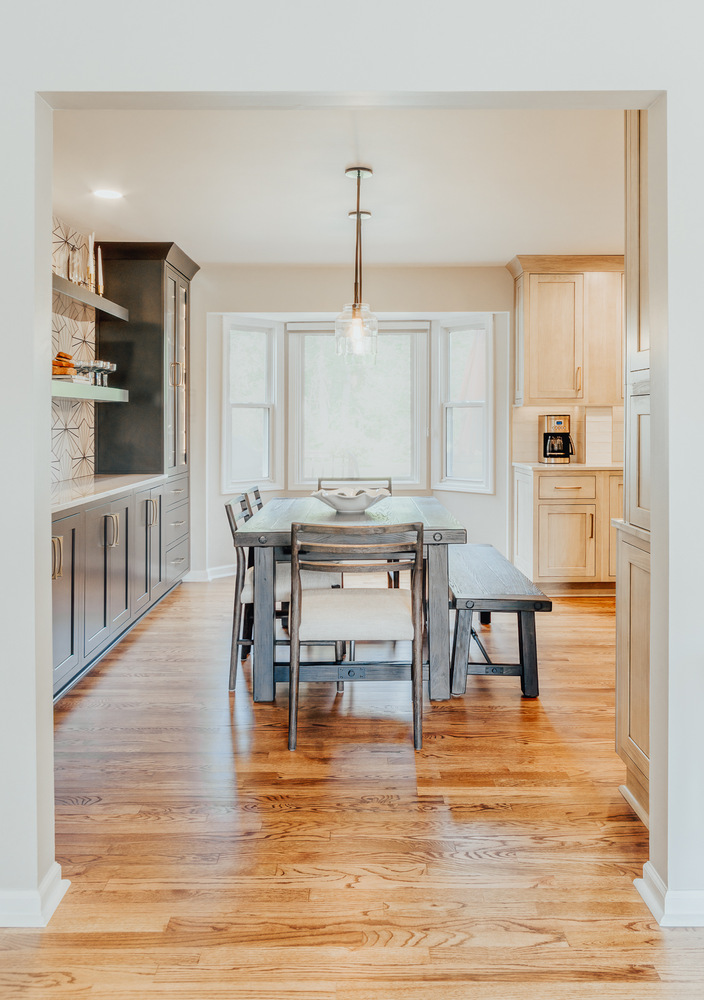 Custom dining nook with built-in cabinetry by Cabinet Creations in Clarkston, MI, part of a full home renovation