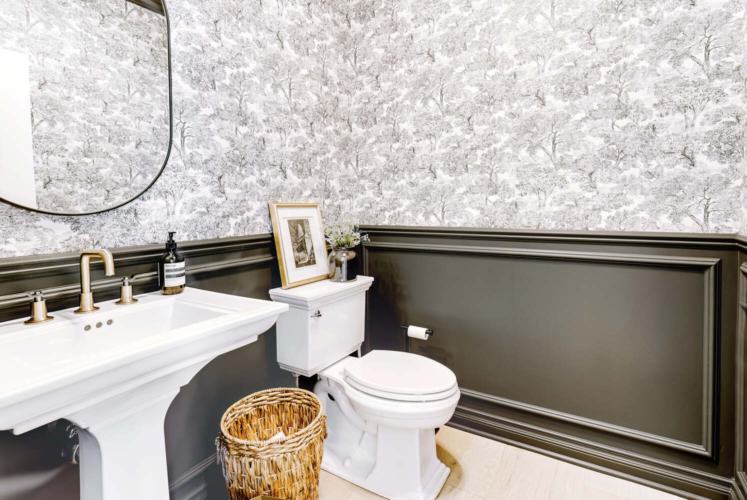 Elegant powder room design with pedestal sink and brass fixtures by Cabinet Creations in Troy, MI Elegant powder room design with pedestal sink and brass fixtures by Cabinet Creations in Troy, MI
