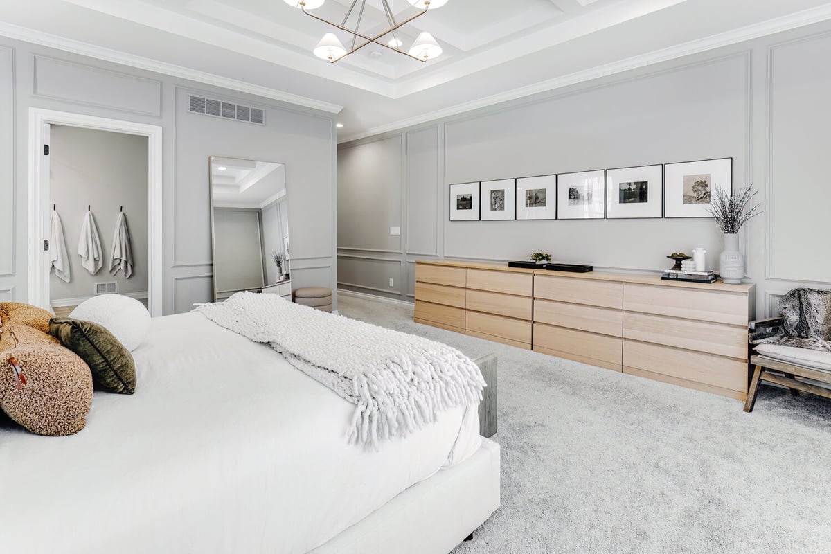 Custom master bedroom with large mirror and entry to ensuite in Drayton Plains, MI