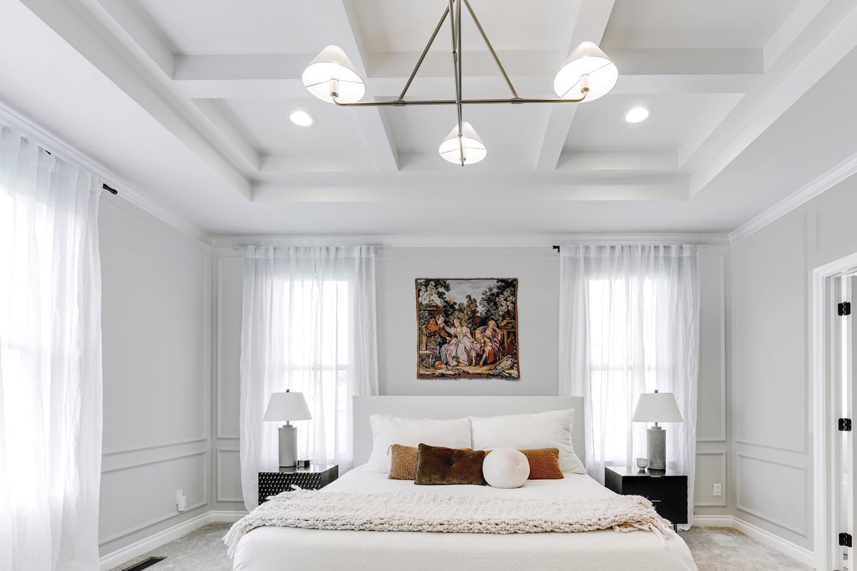 Modern custom master bedroom with chandelier lighting by Cabinet Creations in Troy, MI