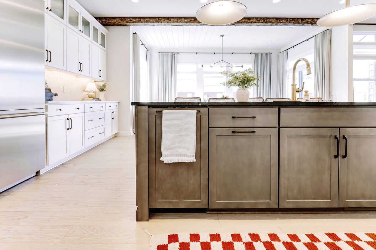 Custom kitchen with large island and white cabinetry by Cabinet Creations in Oakland County, MI