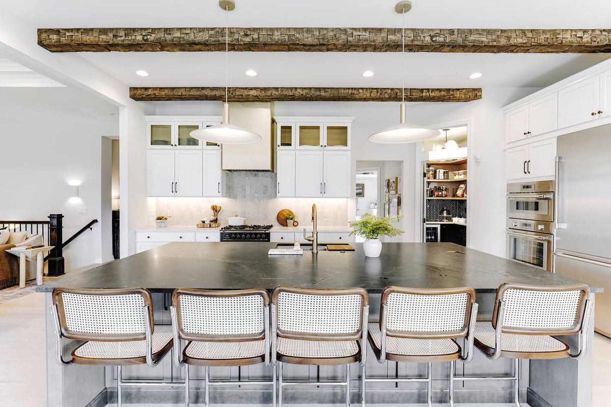 Custom kitchen with mixed metals and natural lighting by Cabinet Creations in Auburn Hills, MI