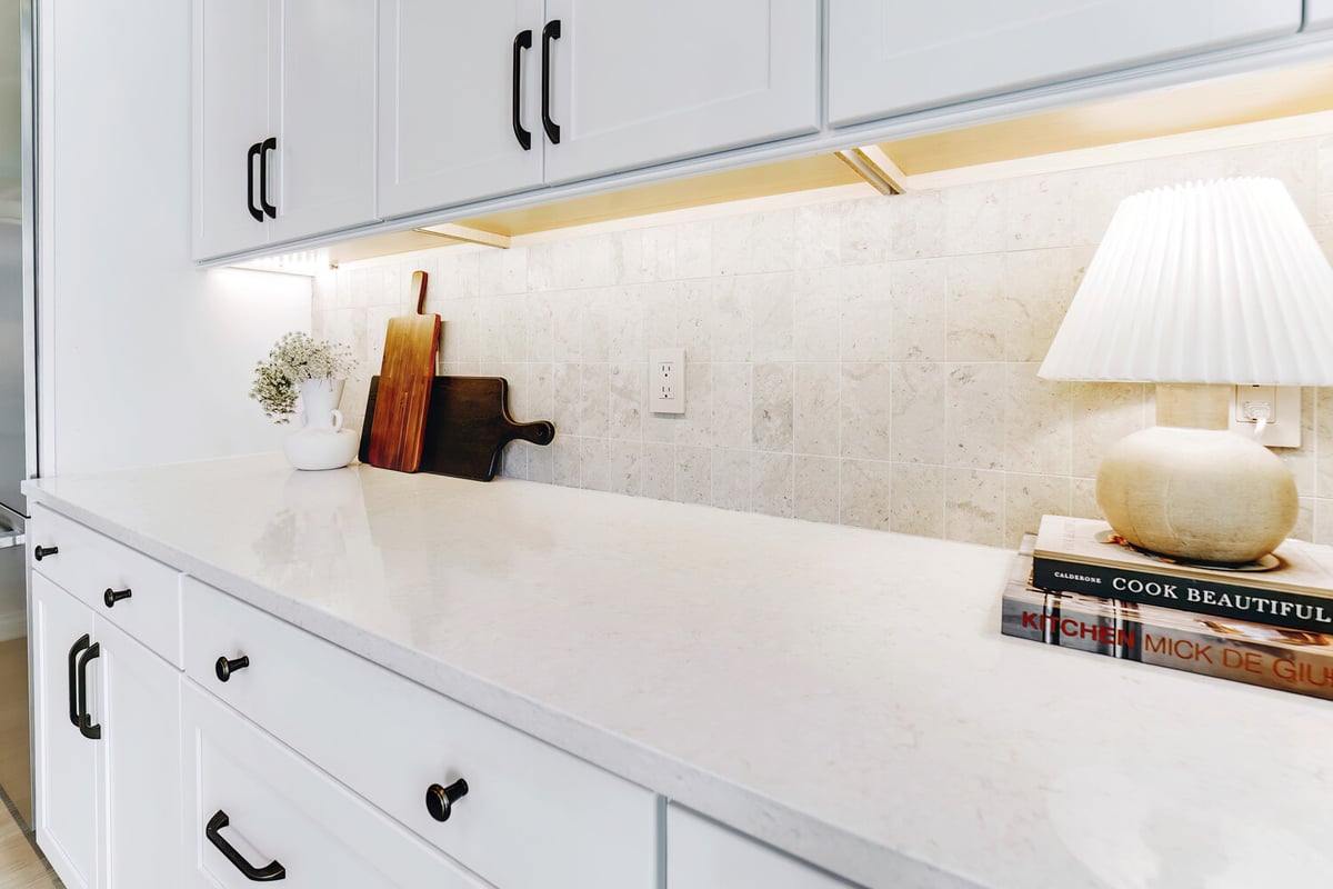 Detailed view of quartz kitchen countertop and tile backsplash in Bloomfield Hills, MI
