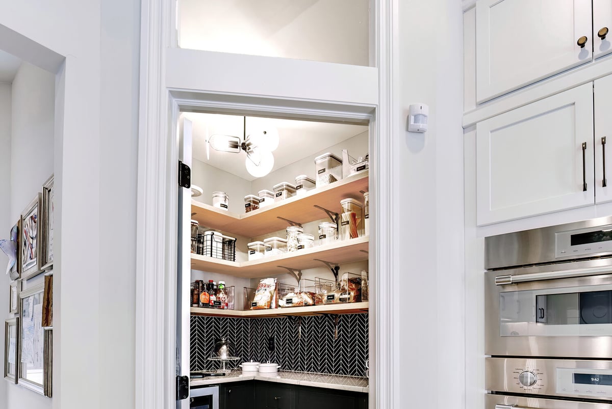 Pantry entry view with built-in shelves and custom cabinetry by Cabinet Creations in Oakland County, MI