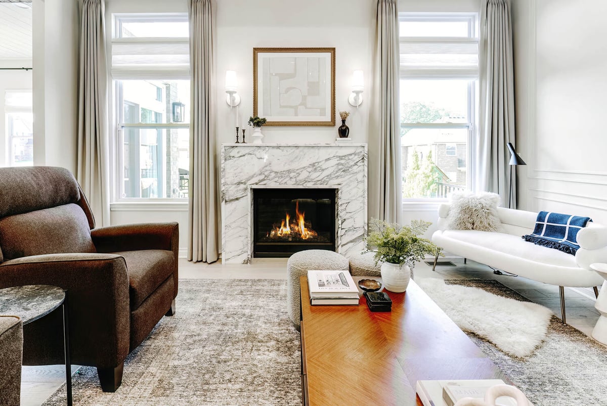 Warm and inviting custom living room with gas fireplace and soft neutral tones by Cabinet Creations, Oakland County, MI