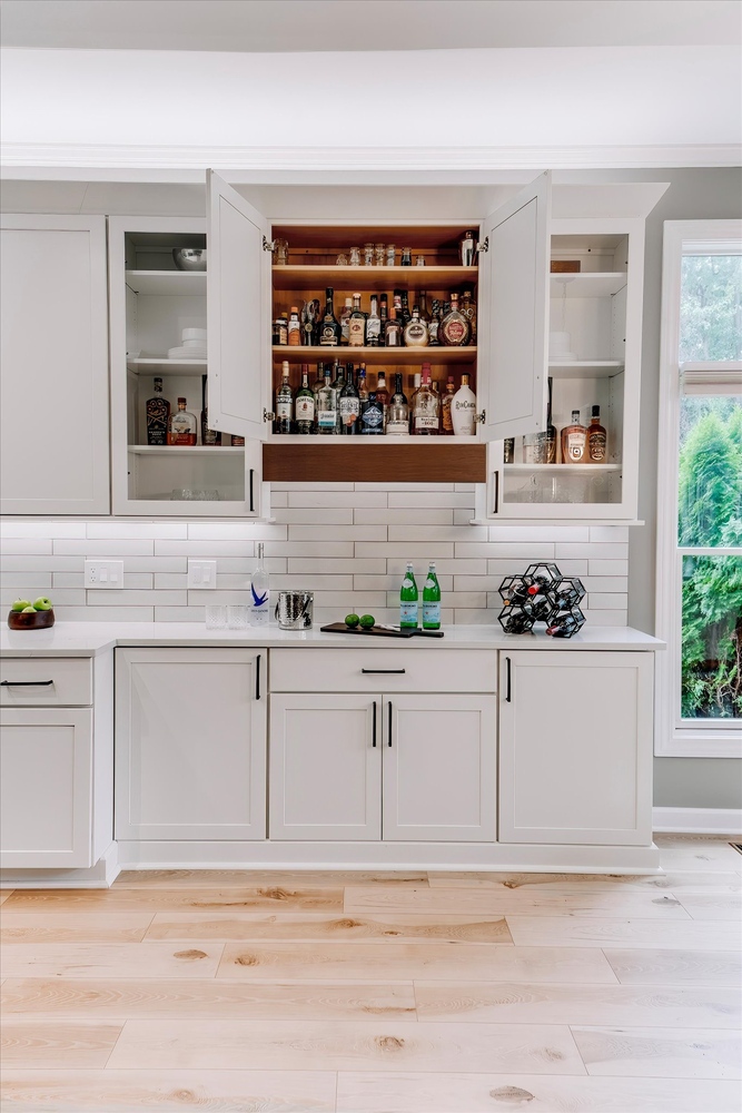 Custom home bar cabinetry with liquor display by Cabinet Creations in West Bloomfield, MI
