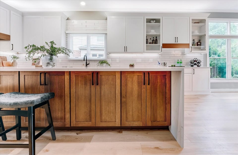 Custom kitchen island with wood base and white quartz countertop by Cabinet Creations in Oakland County, MI
