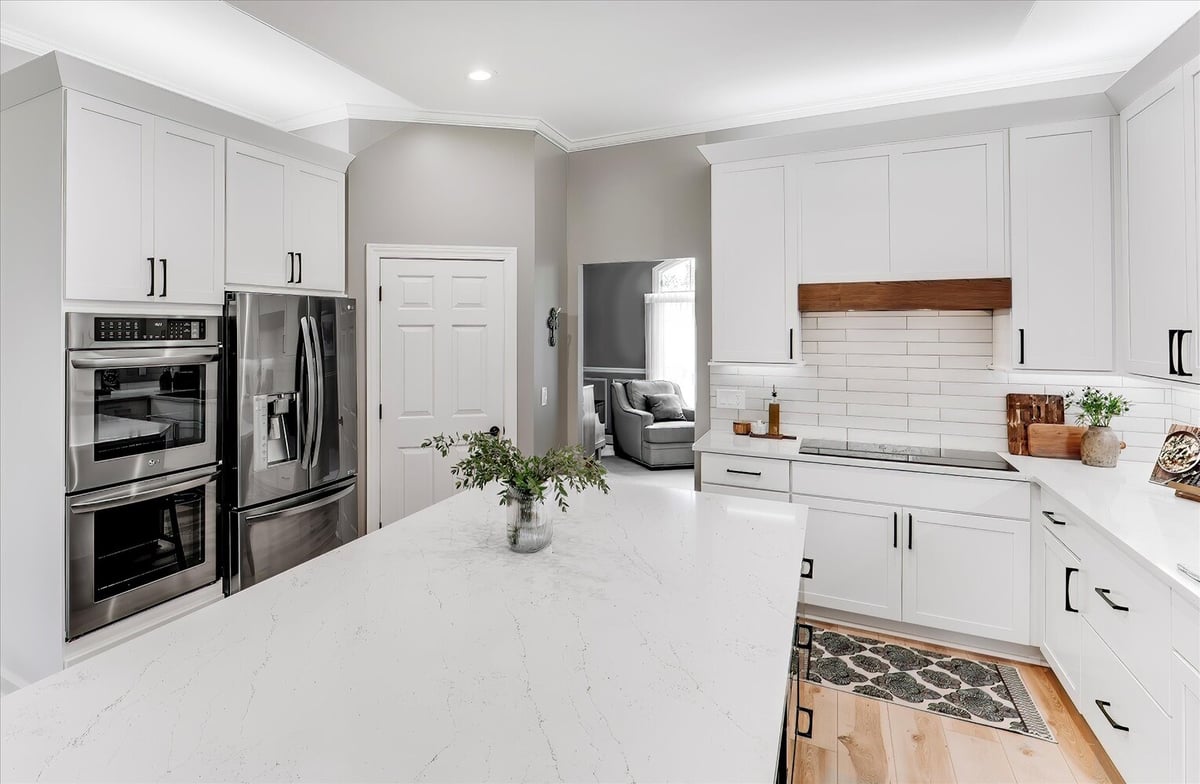 Kitchen design with modern appliances and clean lines in Oakland County home remodel