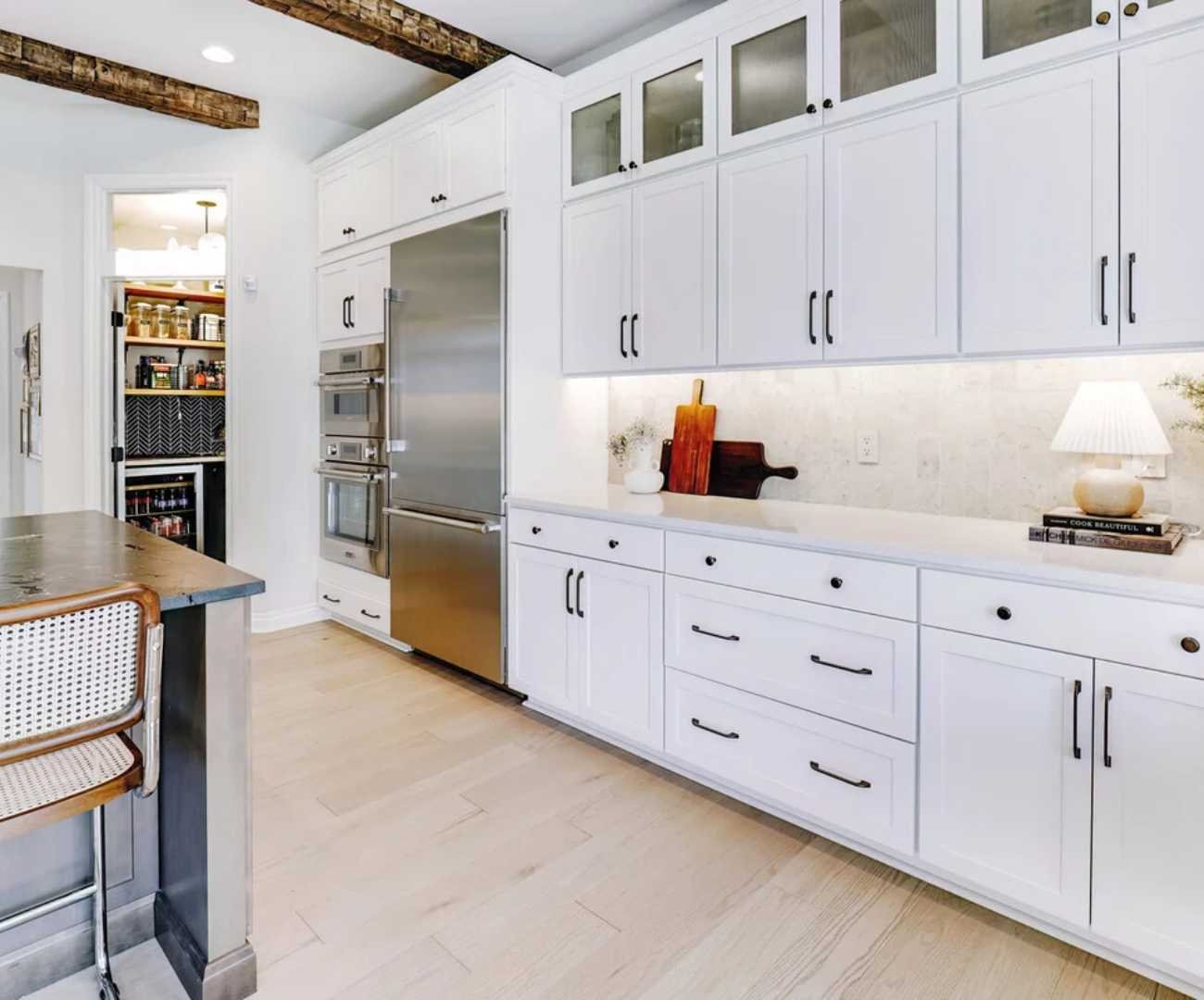 Image of Custom kitchen cabinetry by Cabinet Creations in Rochester, MI with integrated storage and pantry access Image of Custom kitchen cabinetry by Cabinet Creations in Rochester, MI with integrated storage and pantry access