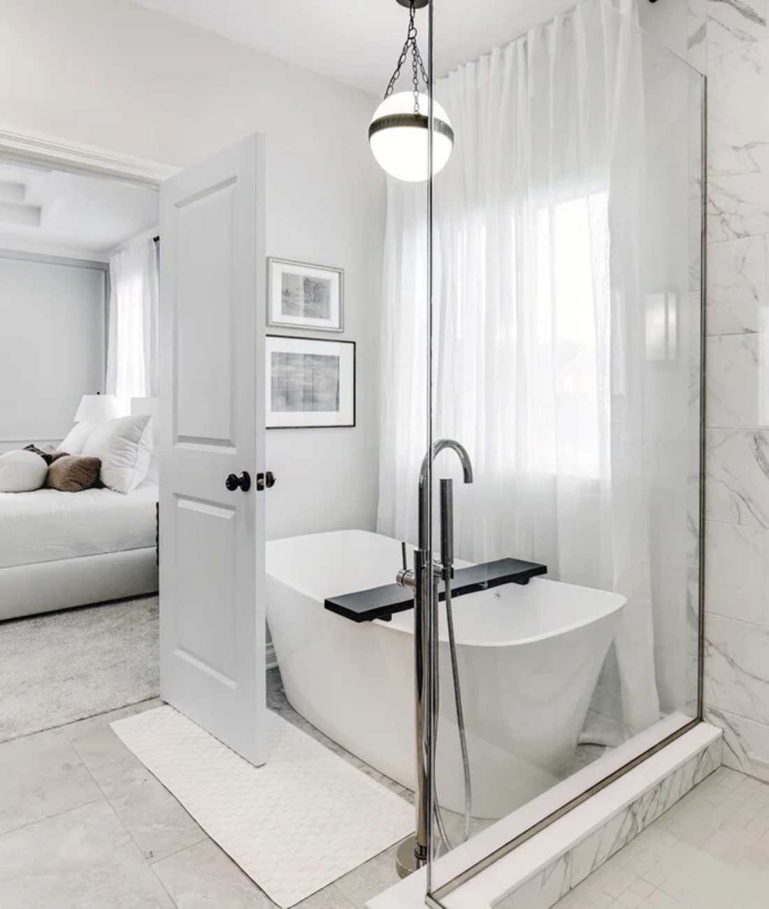 Custom bathroom remodel by Cabinet Creations in Rochester, MI with soaking tub and glass-enclosed sh