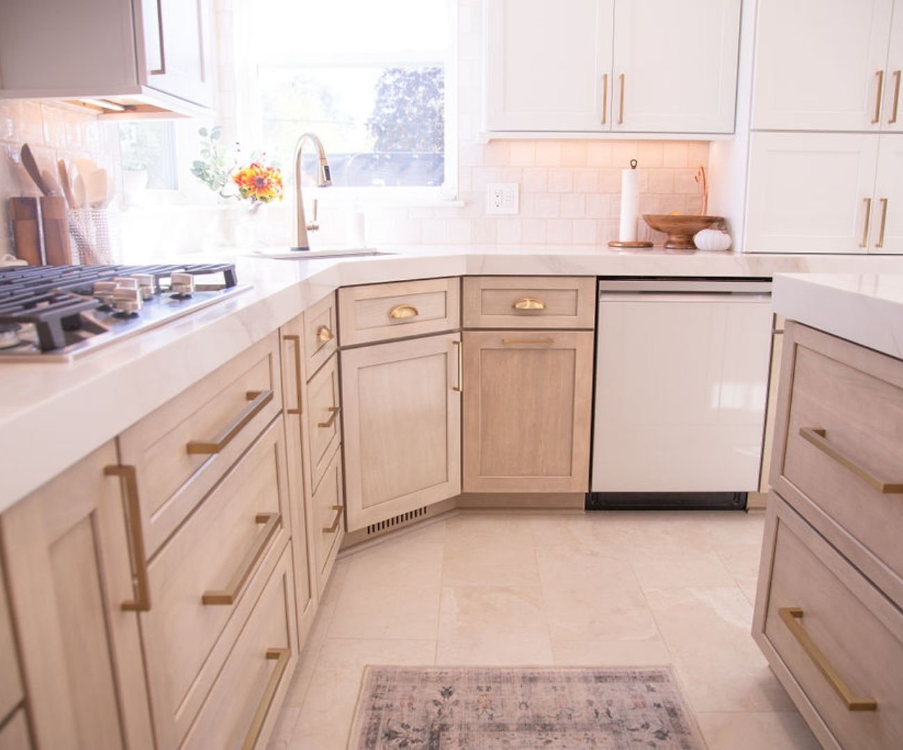 A bright kitchen renovation with custom white-painted and natural wood cabinetry by Cabinet Creations in White Lake Township, MI A bright kitchen renovation with custom white-painted and natural wood cabinetry by Cabinet Creations in White Lake Township, MI