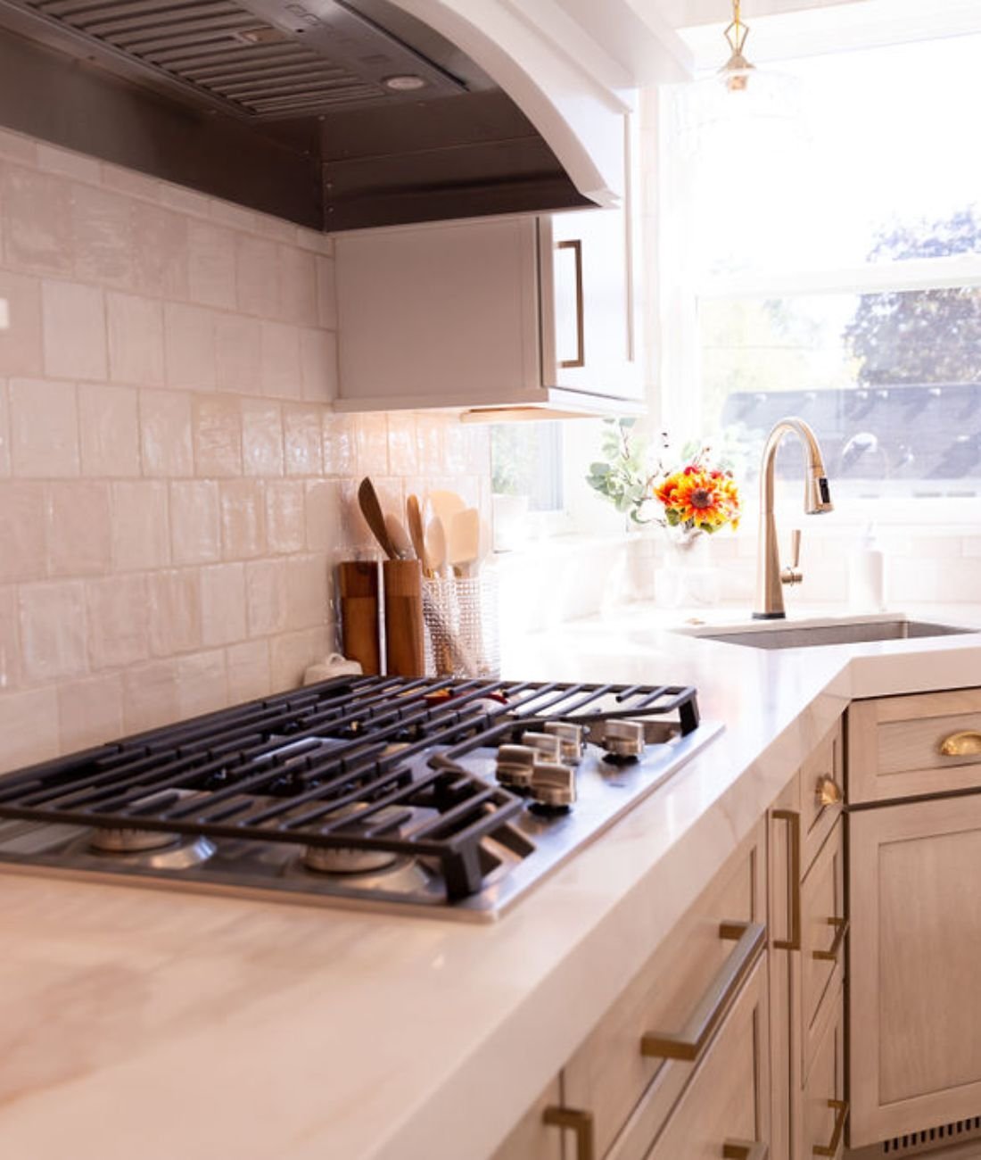 Custom kitchen renovation with tile backsplash and stainless cooktop by Cabinet Creations in Oakland County, MI Custom kitchen renovation with tile backsplash and stainless cooktop by Cabinet Creations in Oakland County, MI
