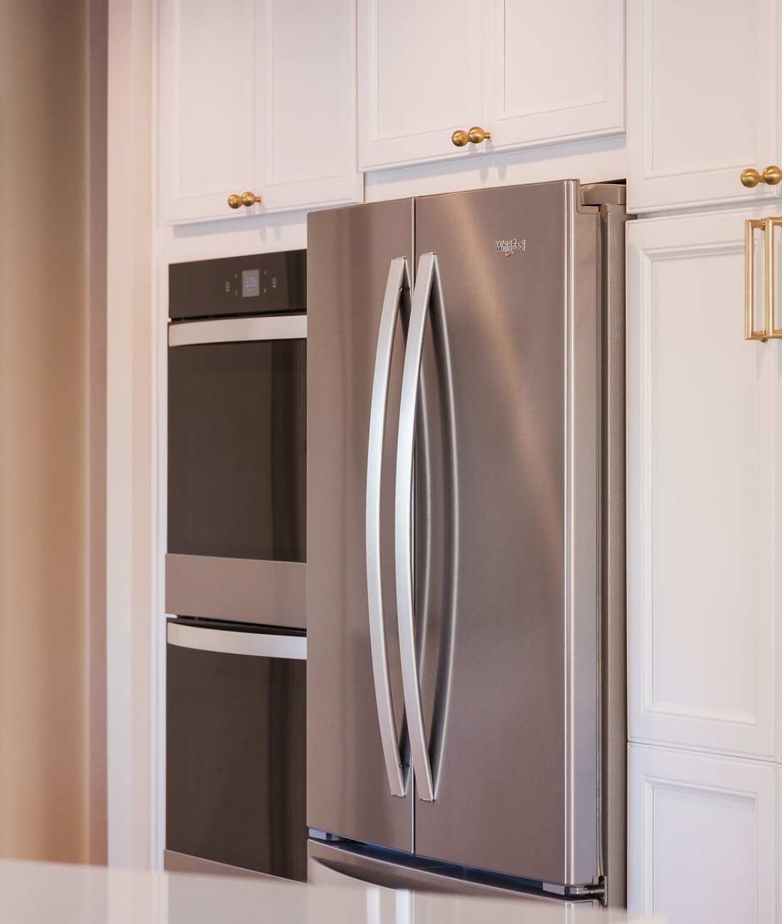 Image of custom kitchen remodel with built-in stainless appliances in West Bloomfield, MI by Cabinet Creations